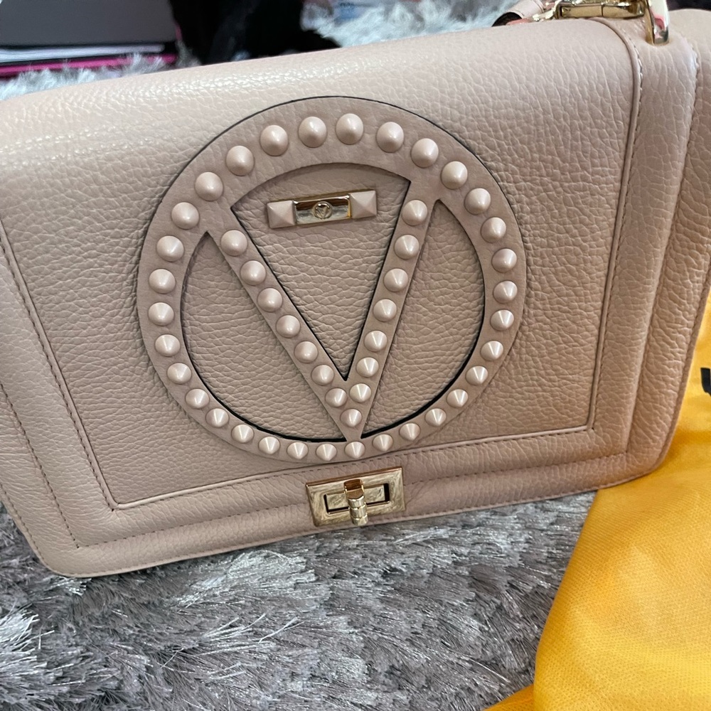 Valentino pebbled leather shoulder bag.